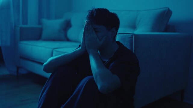 Stressed Man Experiencing Anxiety and Mental Distress