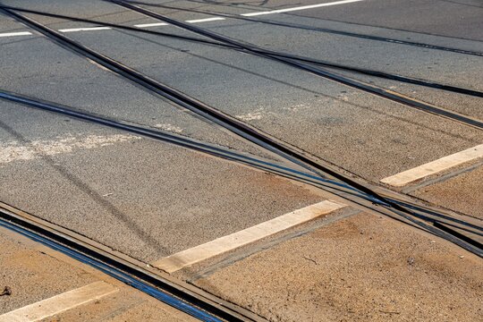 Tram tracks connecting on a city road infrastructure