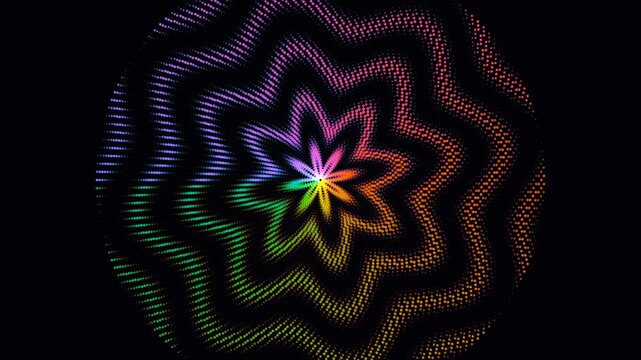 Abstract rainbow dotted mandala glowing on black background
