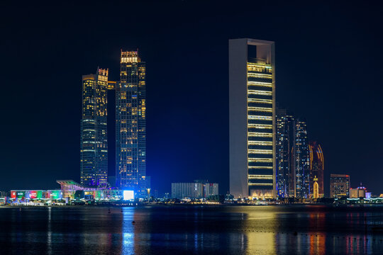 ADNOC headquarters and Abu Dhabi skyline at night