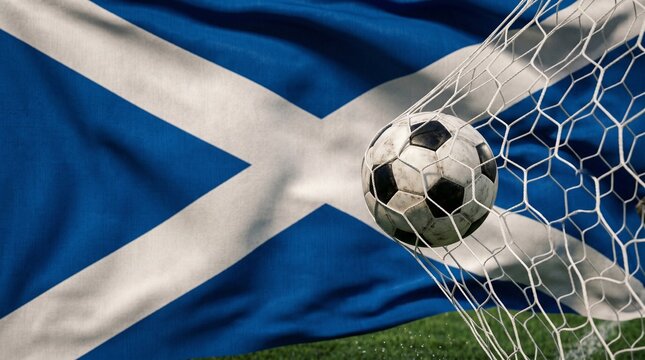 Soccer ball hitting the goal net with the waving flag of Scotland in the background, symbolizing victory and national pride in football