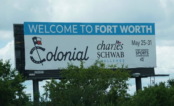 Northern Texas, U.S.A - May 27, 2026 - The Fort Worth billboard promoting Colonial Charles Schwab Challenge golf tournament with event dates and sports commission branding.