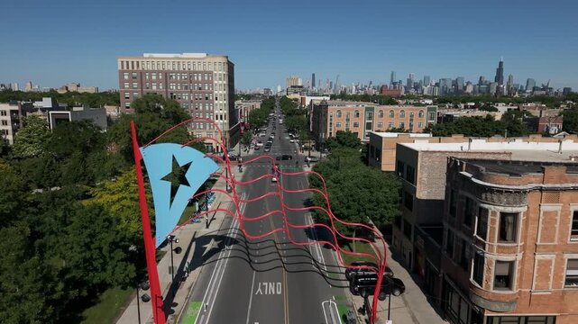 Puerto Rican flag in Chicago's Humboldt Park neighborhood. 

Taken June 2nd, 2026 in Chicago, IL - The drone backs away from the flag