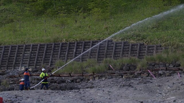 4K video of firefighters conducting outdoor fire suppression training