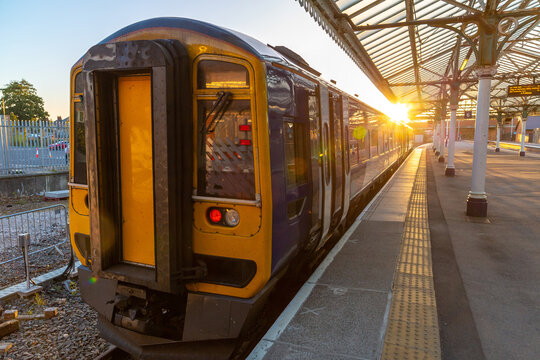 Diesel Multiple Unit train at Bridlington Railway Station at golden sunset, East Riding of Yorkshire, England, UK