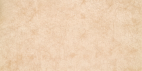 Fototapeta premium A detailed texture of light brown leather showcasing its natural grain and subtle imperfections, providing a tactile and organic background.