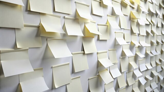 White sticky note stickers stuck on white background