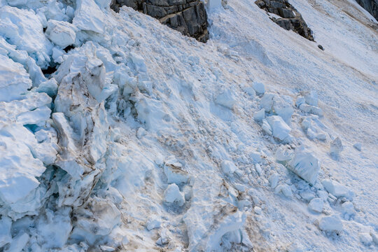 Blue Glacier Ice and Snow on Steep Mountain Slope, BC, Canada
