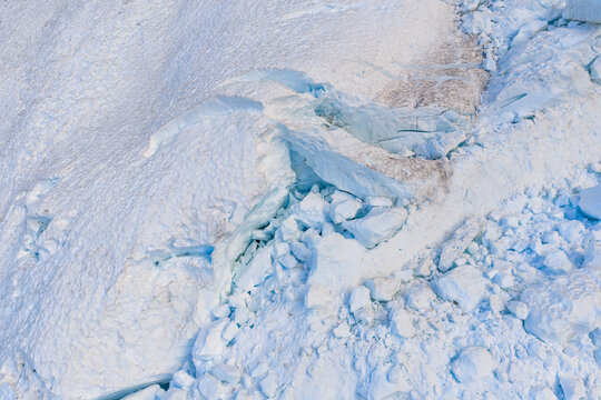 Aerial View of Blue Glacier Ice and Crevasses on Snowfield in British Columbia, Canada