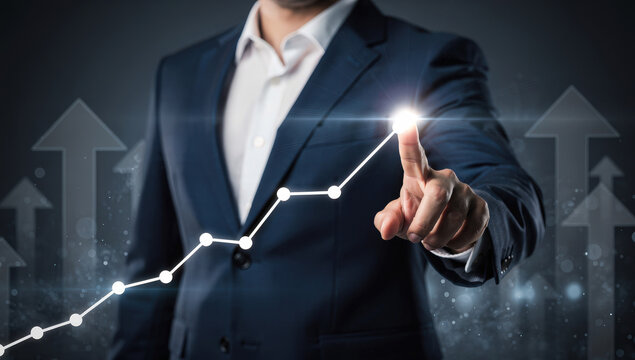 Businessman touching upward trending graph on digital interface showing business growth and success