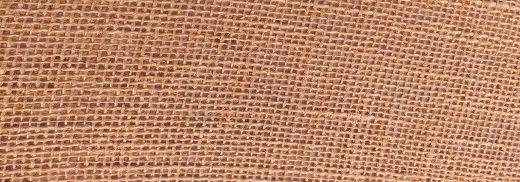 Brown burlap cloth background or sack cloth for packing