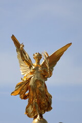 angel of victory statue at victoria memorial, buckingham palace in london
