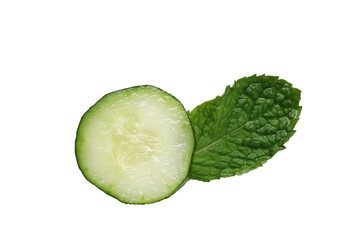 Fresh cucumber slice paired with a green mint leaf © Bowonpat