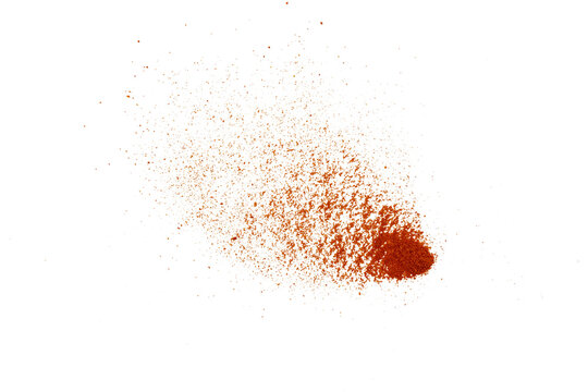 Orange Chili powder splash cloud On Transparent Background, abstract texture with scattered particles and copy space.