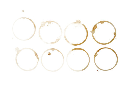 A set of eight coffee coffee or tea cup stain rings in various shades of brown and tan, arranged in two rows of four, with different levels of saturation and texture, On Transparent Background