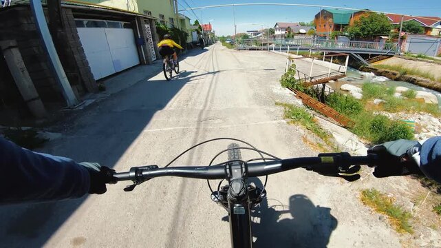 Cyclist ride bicycle at city road