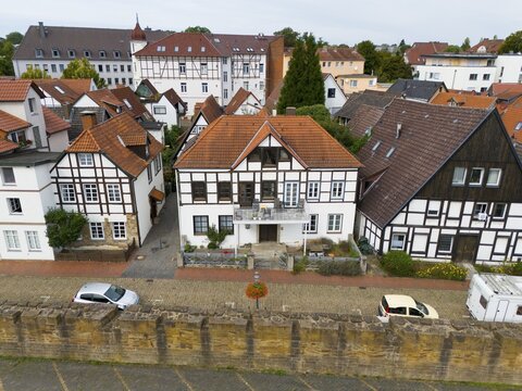 Half-timbered houses in an urban setting reflecting traditional European architecture, aerial view, fishing town on the Weser, Minden, North Rhine-Westphalia, Germany