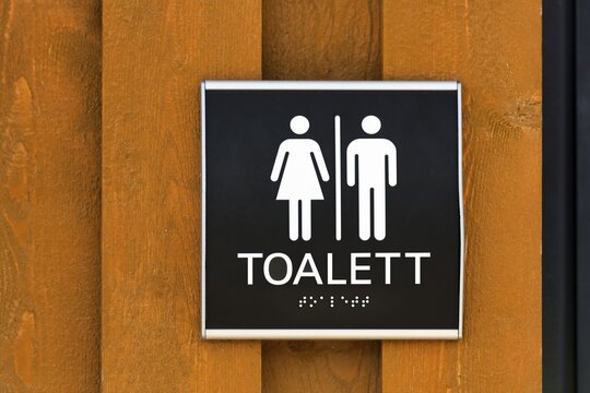 WC sign, pictogram man, woman, gender separation, inscription in Braille, Norway