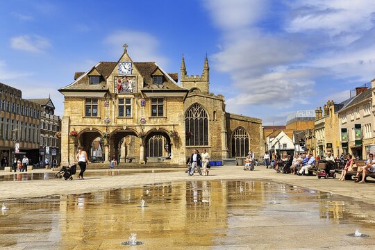 Cathedral Square with Guildhall or Butter Cross and Visitors, Peterborough, Cambridgeshire, England, United Kingdom