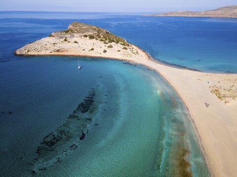 Drone shot, double bay of Simos beach, Sarakiniko beach, Elafonisos, Deer Island, Laconia, Peloponnese, Ionian Islands, Ionian Sea, Greece