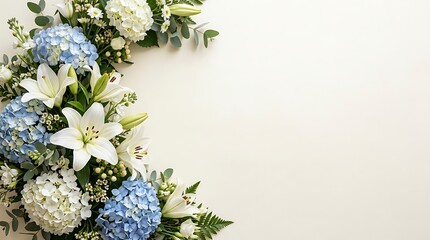Elegant floral border with white lilies and blue hydrangeas © Gandi