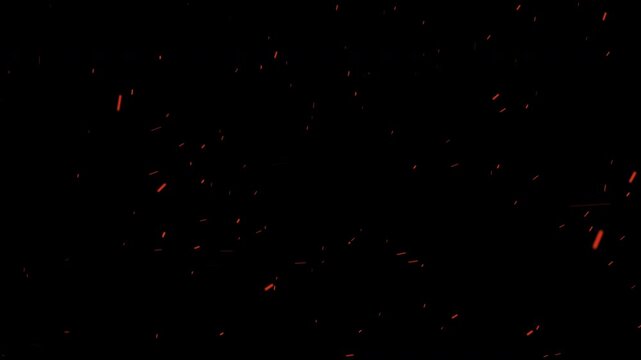 Realistic glowing fire sparks embers isolated black background VFX overlay for cinematic motion graphics and video editing compositing.