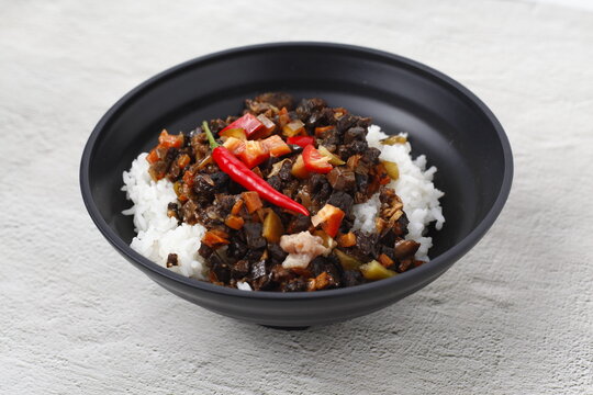 Ffreshly cooked Filipino food Bopis rice bowl