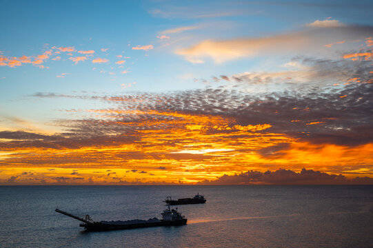 Colorful Ocean Suset with Silhouette of Ships in Antigua and Barbuda, Caribbean