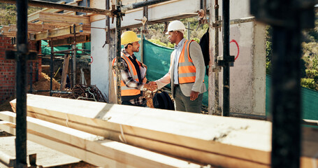 Fototapeta premium Civil engineering, handshake and men with clipboard, construction and safety inspection for project. Architect, shaking hands and happy people with checklist for architecture, agreement and teamwork