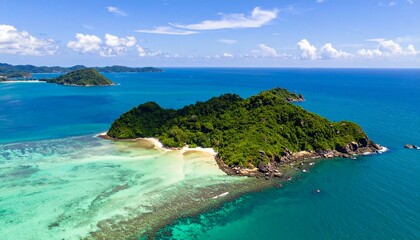 Fototapeta premium Aerial view of tropical island with turquoise waters and sandy beach.