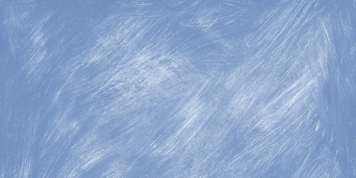 Blue chalkboard texture with white scratched marks on a smooth surface for design and education backgrounds