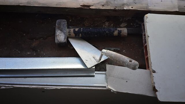 Construction tools abandoned on a demolition site