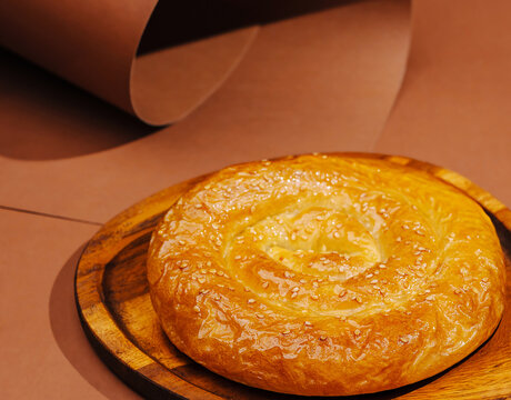 Traditional moldovan placinta pastry on wooden board