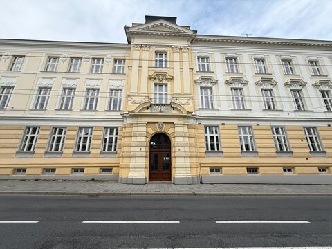 Historical building of the Mendel Grammar School with a classicist facade in Opava, Czech Republic