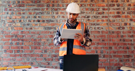 Plakat Construction site, confused and man on tablet for building review, mistake and materials delay. Architecture, contractor and person on tech with error for renovation project, remodeling and concern
