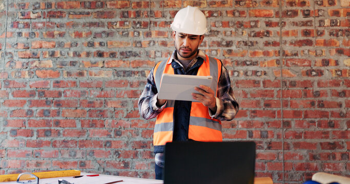 Construction site, confused and man on tablet for building review, mistake and materials delay. Architecture, contractor and person on tech with error for renovation project, remodeling and concern