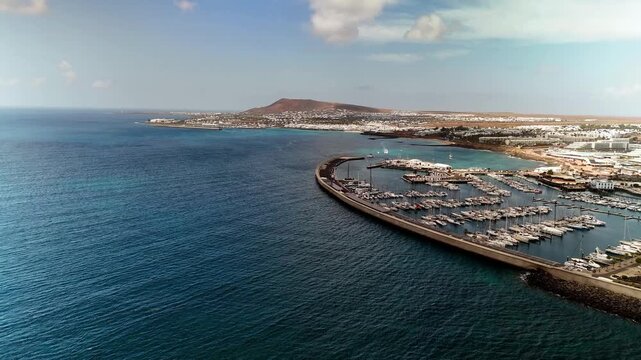 Aerial view of Marina Rubicon sailboats and Playa Blanca coastline, Lanzarote