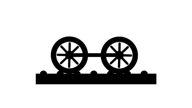 Two automotive wheels placed side by side on a platform or base, representing a paired tire display, wheel storage or balanced suspension setup in service