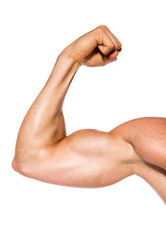 Muscular man flexing his biceps in front of white background, close-up