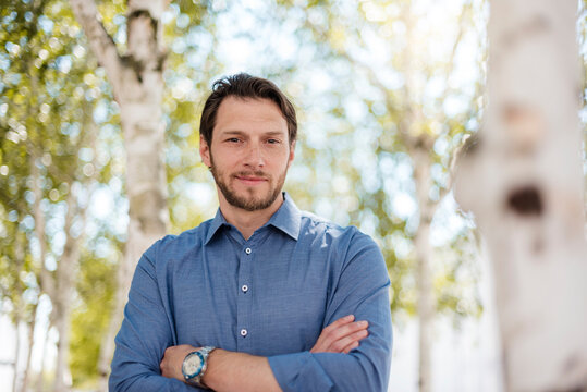 Portrait of confident businessman outdoors in the nature