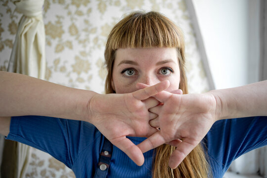 Female student covering her face
