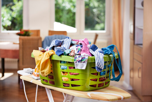 Germany, North Rhine Westphalia, Cologne, Clothes in laundry basket