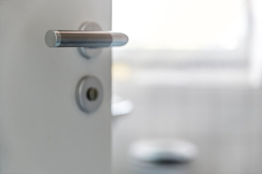 Doorknob of open bathroom door