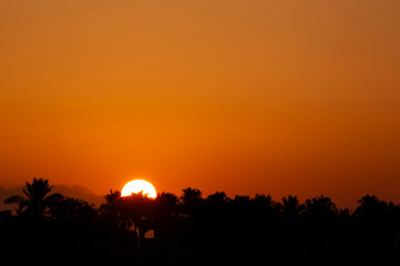 Fototapeta premium view on sunrise behind resort at Sinai Peninsula