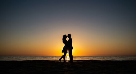 Fototapeta premium Couple embracing on a beach at sunset with ocean view