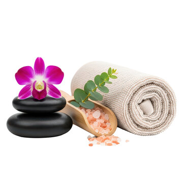 Spa essentials with orchid stones salts and towel for relaxation and wellness