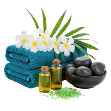 Spa essentials with towels essential oils and massage stones