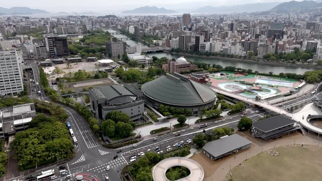 Aerial Flight Over Central Hiroshima Cityscape and Ota River Delta Japan