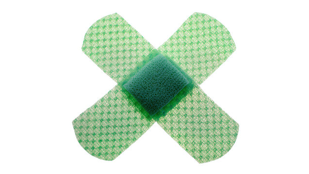 Green mesh bandage crossed over white