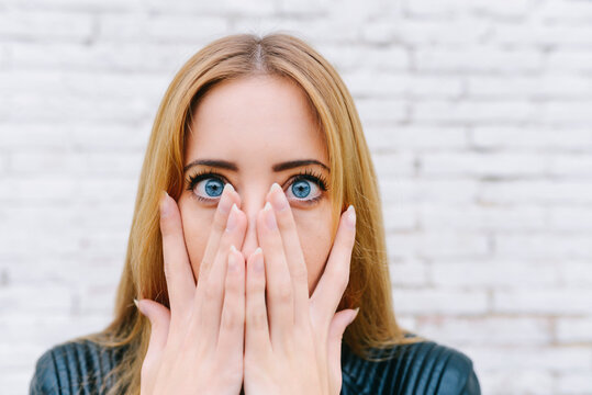 Portrait of surprised young woman